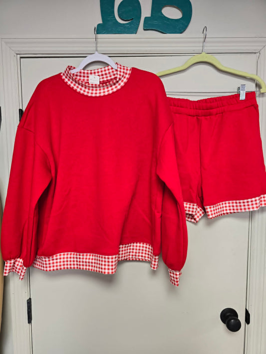 Red and white sweatshirt and shorts