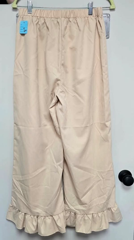 Beige pants with ruffle